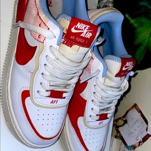 7.5 Womens. Nike Airforce 1s red and blue